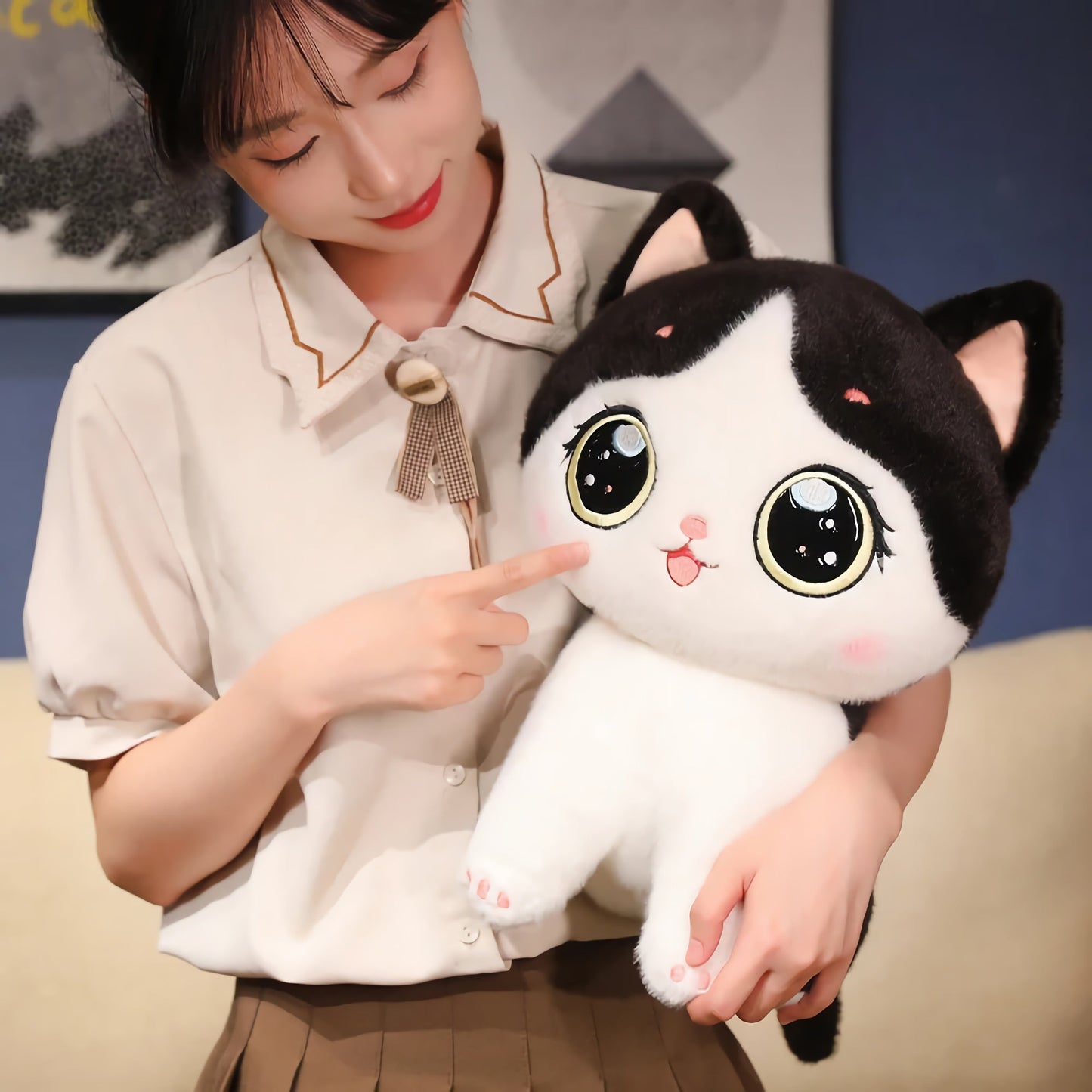 Adorable peluche chaton aux grands yeux