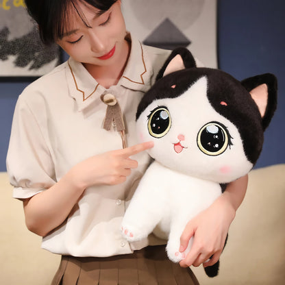 Adorable peluche chaton aux grands yeux