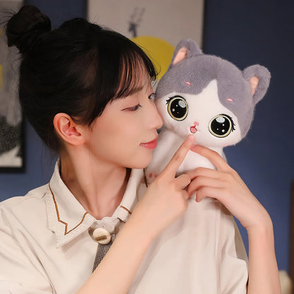 Adorable peluche chaton aux grands yeux