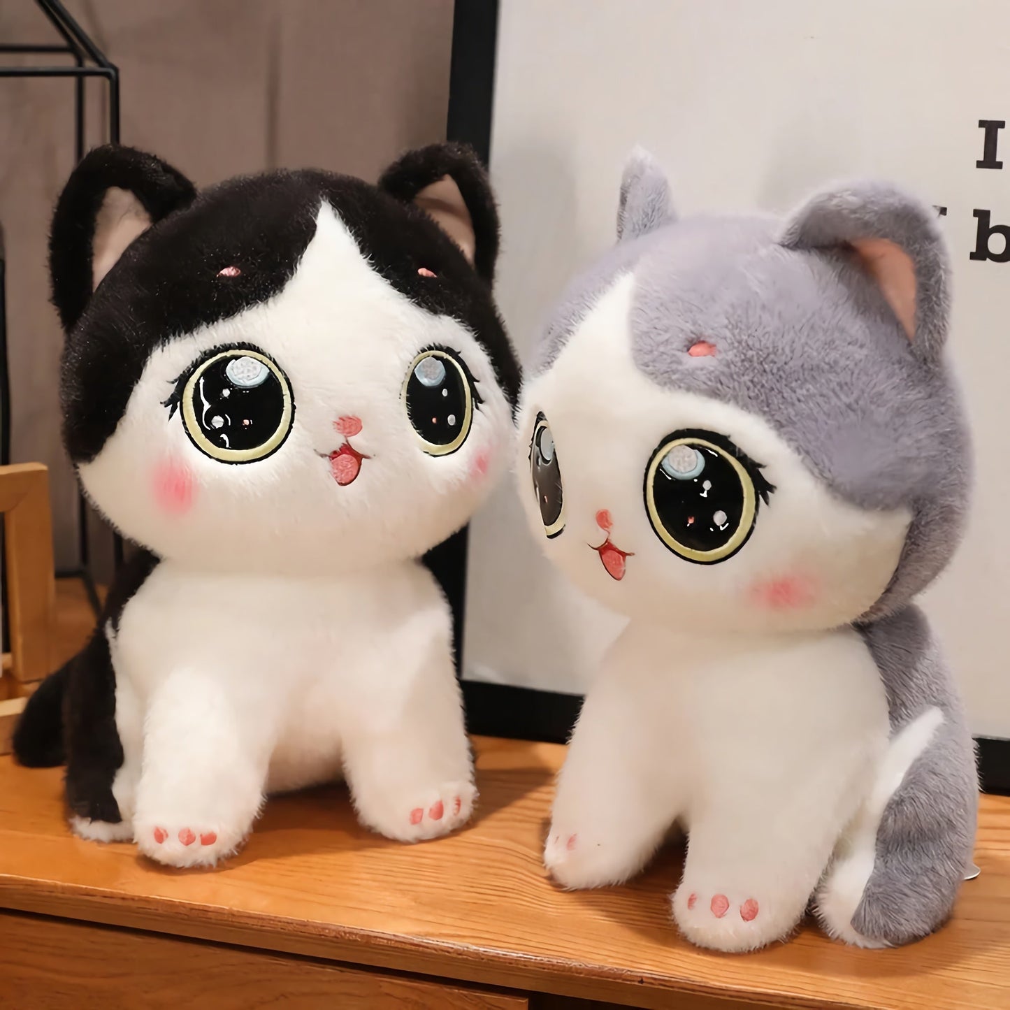 Adorable peluche chaton aux grands yeux