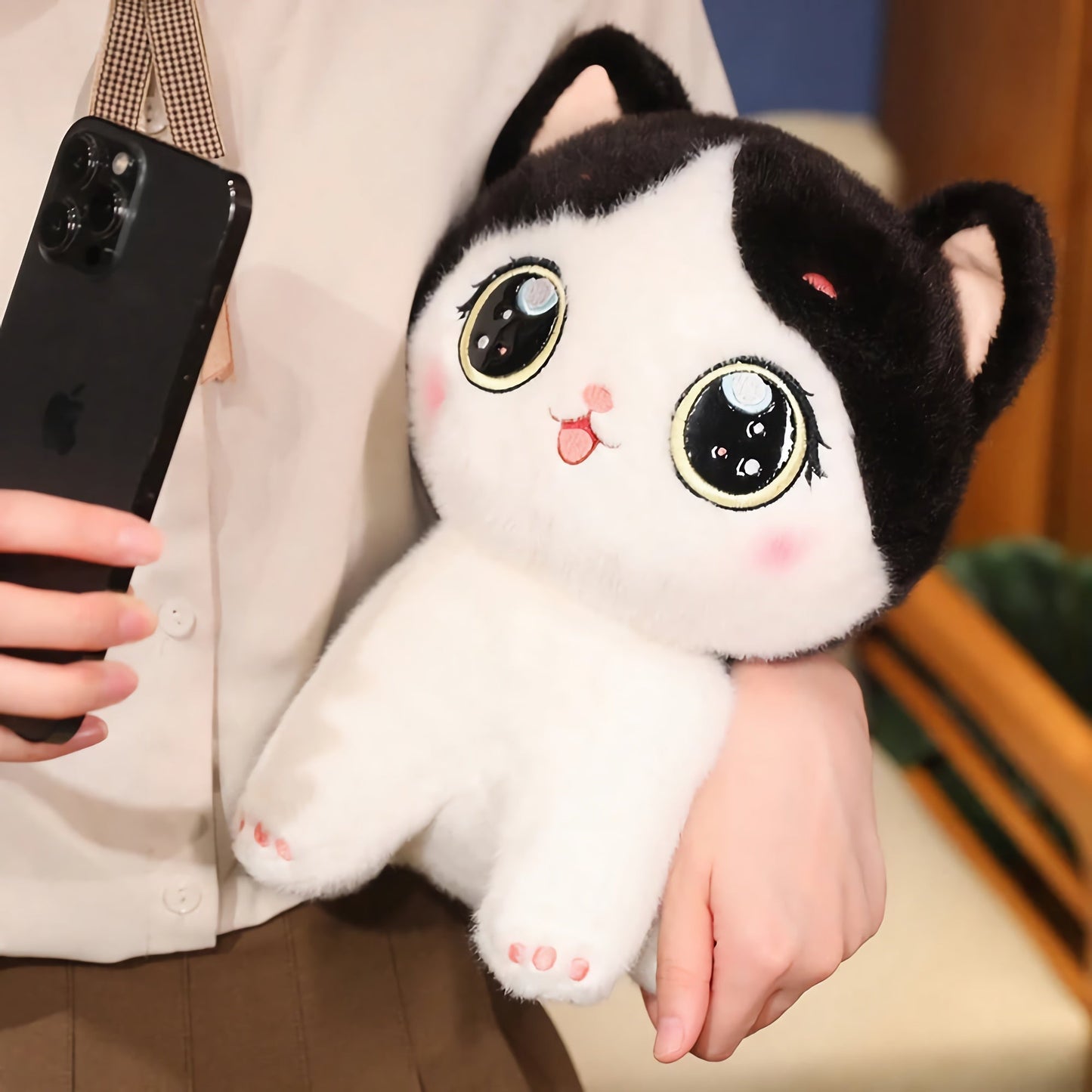 Adorable peluche chaton aux grands yeux
