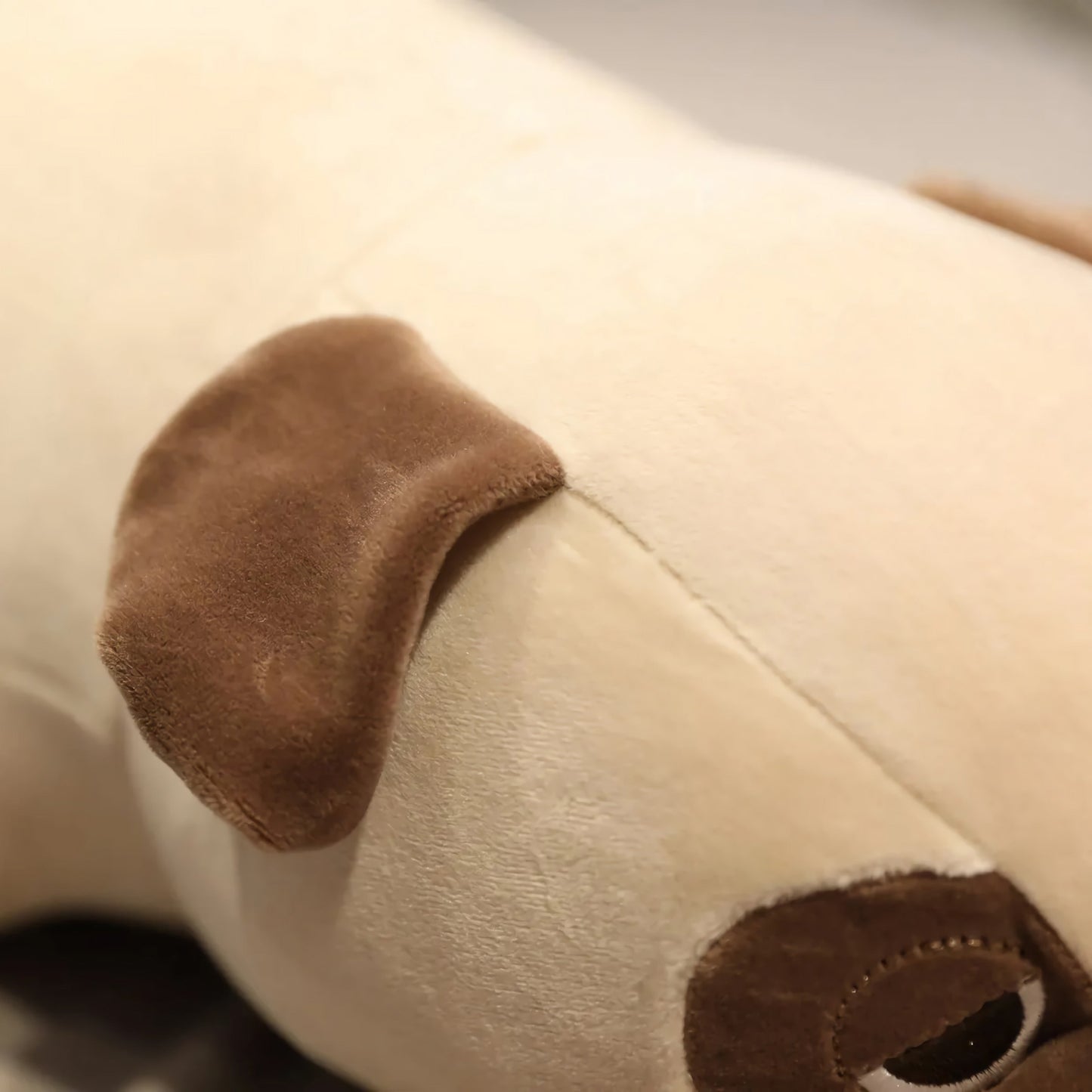 Peluche carlin paresseux en miche